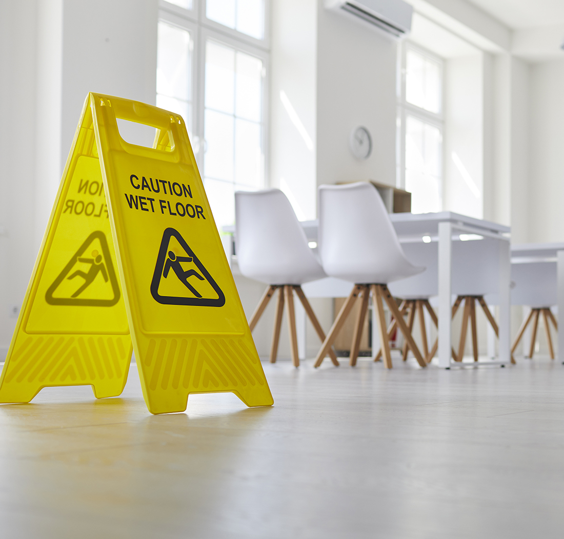 Caution wet floor sign to prevent personal injury.